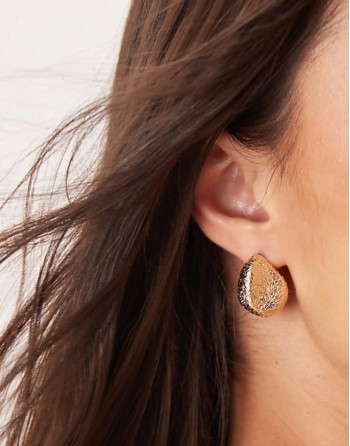 stud earrings with textured molten design in gold tone