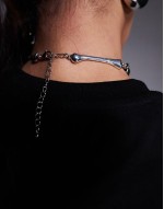 choker necklace with skeleton hand design
