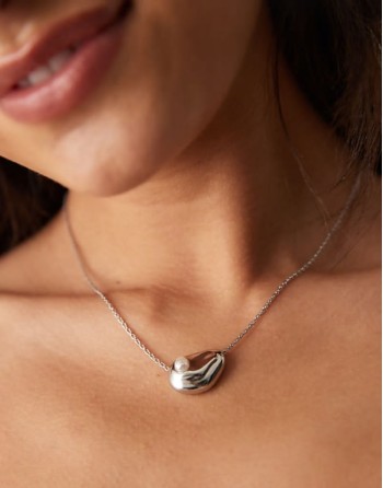necklace with molten faux pearl pendant in silver tone