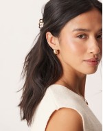 stud earrings with mini dome stud in brushed gold tone