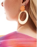 door knocker earrings with hammered circle design and enamel detail in gold tone