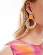 door knocker earrings with hammered circle design and enamel detail in gold tone