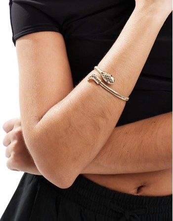 wrap bracelet with snake detail in gold tone