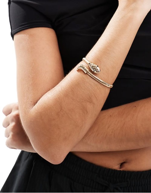 wrap bracelet with snake detail in gold tone