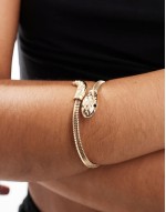 wrap bracelet with snake detail in gold tone