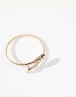 wrap bracelet with snake detail in gold tone