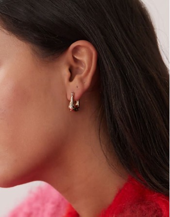 hammered hoop earrings in gold