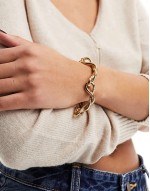 bracelet with twisted chain design in gold tone