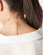 torque choker with wave design in silver tone