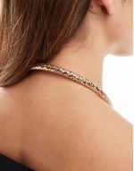 torque choker with snake design in gold tone