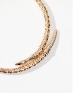 torque choker with snake design in gold tone